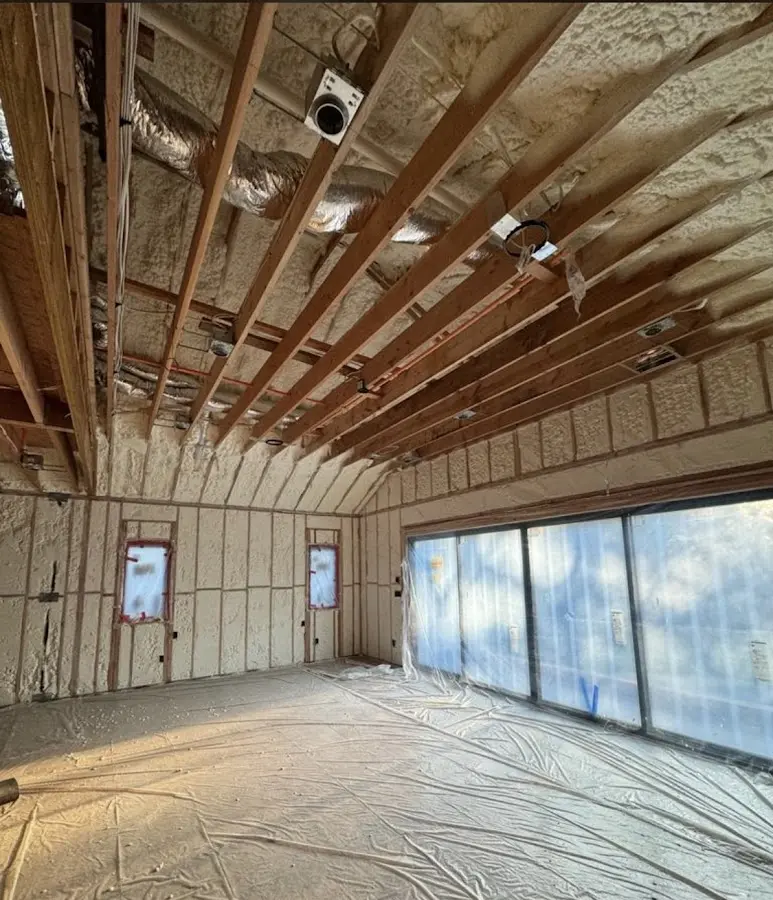 Interior walls and ceiling insulated with spray foam during new construction in University Park